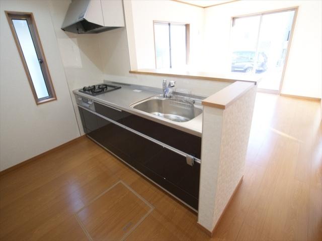 Kitchen. Face-to-face kitchen overlooking the living room
