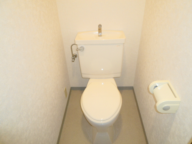 Toilet. Same property, Is another of the room.