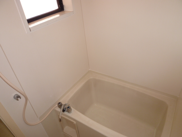 Bath. It is a photograph of another room