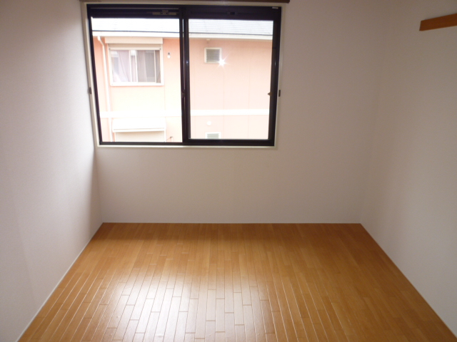 Living and room. It is a photograph of another room