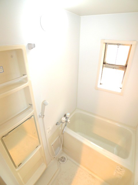 Bath. There is a window in the bathroom