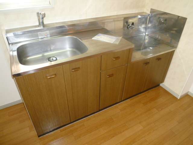 Kitchen. Same property, Is another of the room.