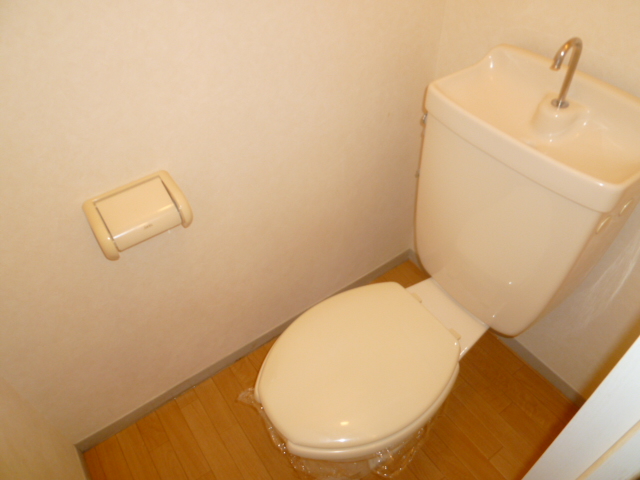 Toilet. Same property, Is another of the room.