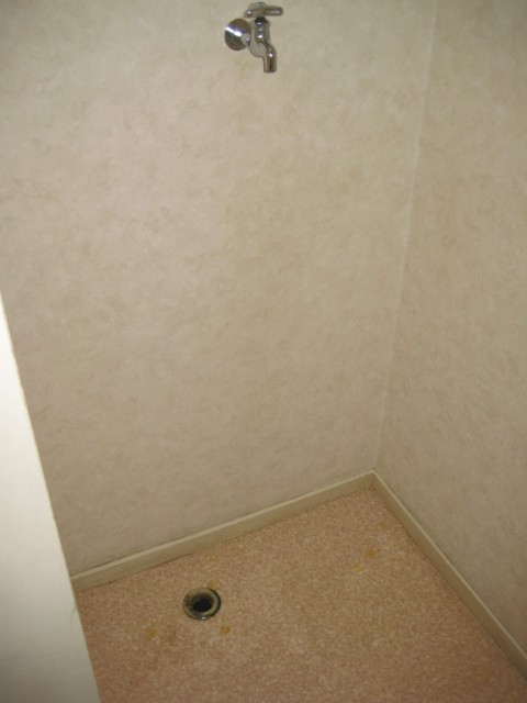 Other Equipment. Washing machine in the room