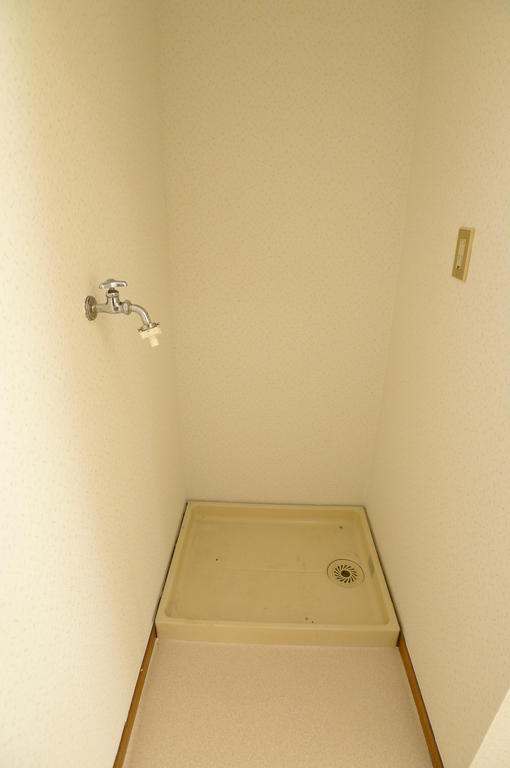 Other Equipment. Washing machine in the room