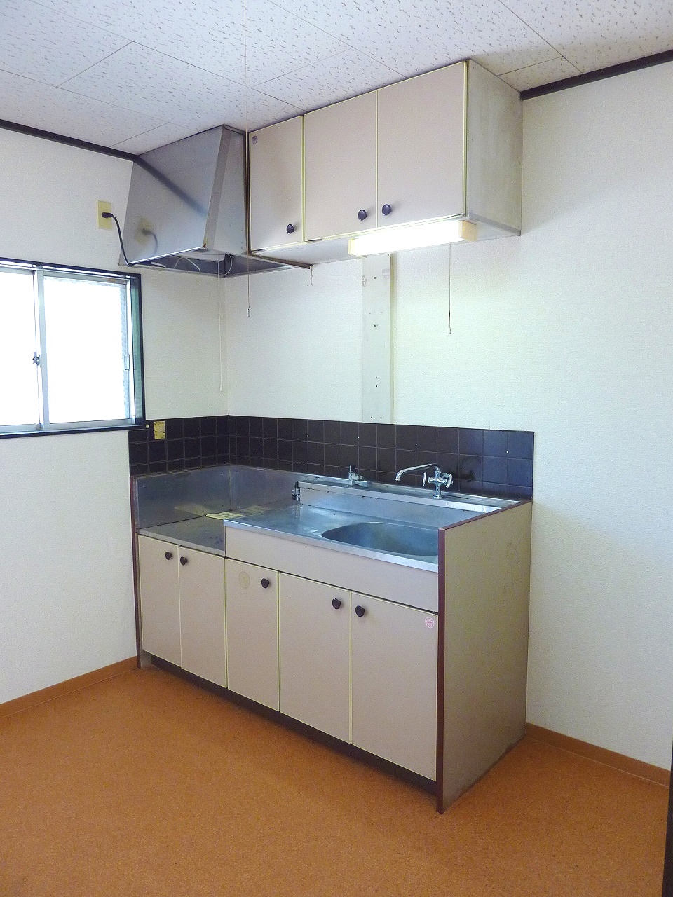 Kitchen. It is a kitchen with a small window