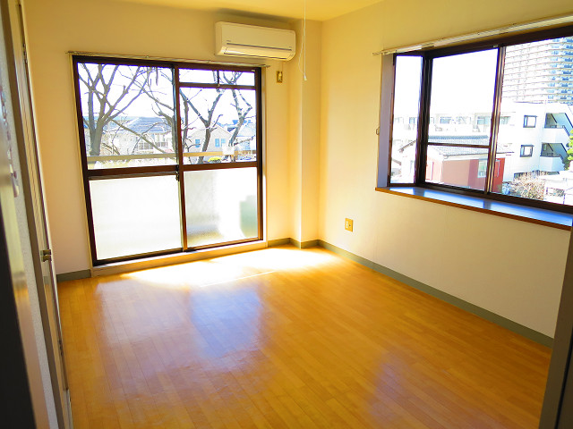 Living and room. The living room has large windows