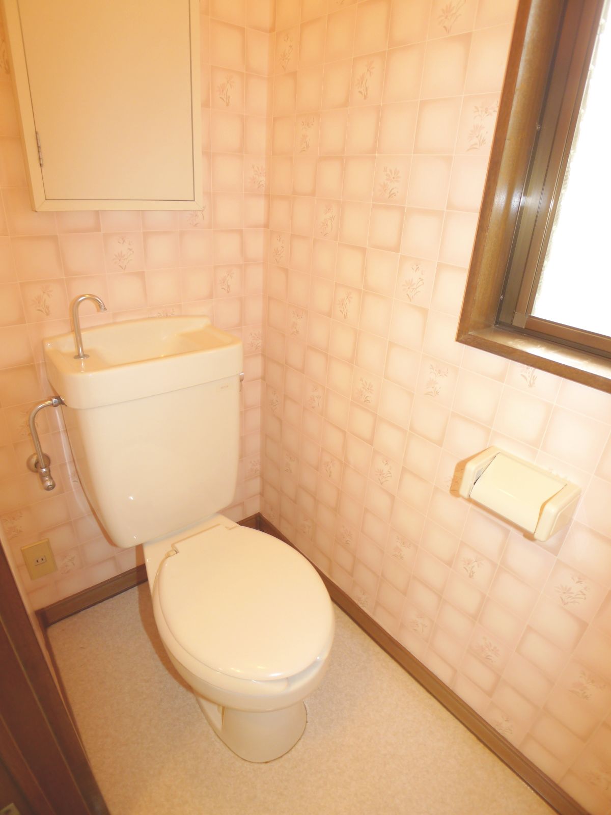 Toilet. There are window