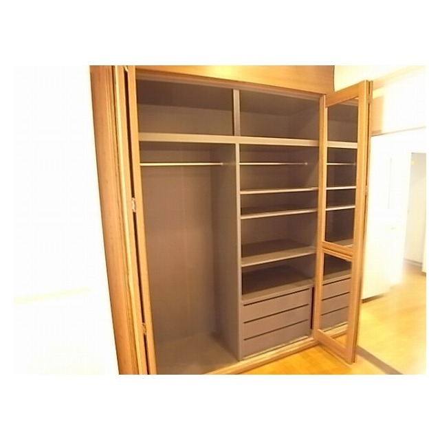 Other room space. Full-length mirror on the closet door +