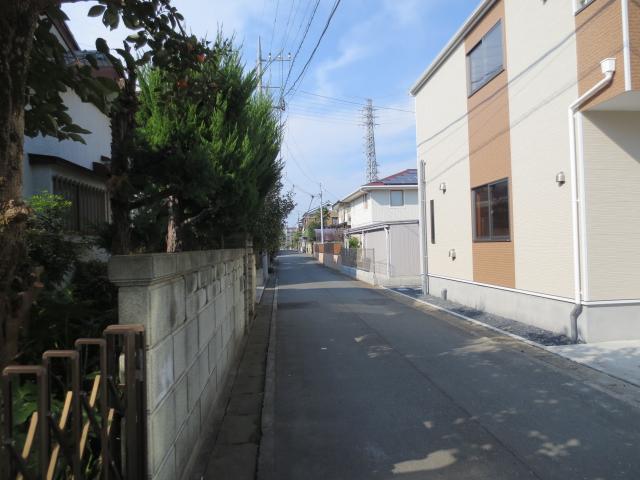 Local photos, including front road. 1 Building