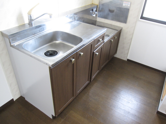 Kitchen. It has a window to the kitchen only a corner room