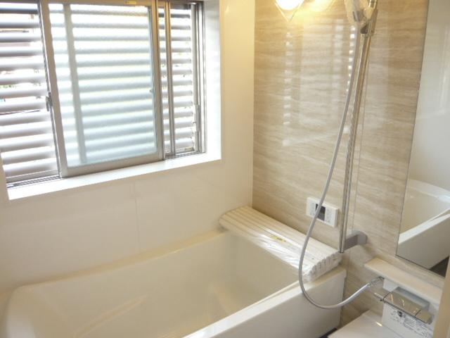 Bathroom. It is white