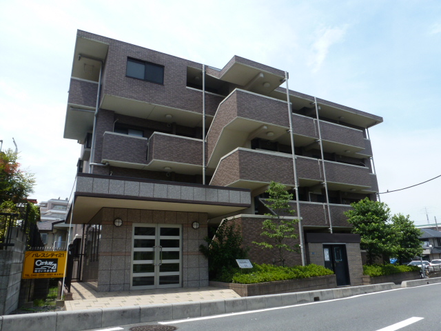 Building appearance. RC structures 2LDK apartment in town leisurely spread