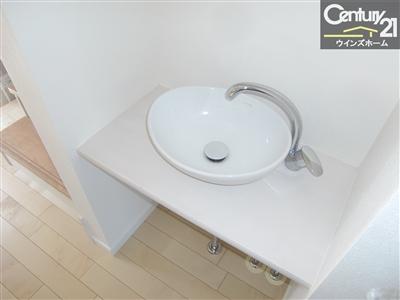 Wash basin, toilet. Hand wash as soon as the go up the entrance