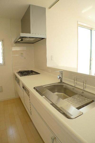 Kitchen.  Bright kitchen, which also includes dishwashers