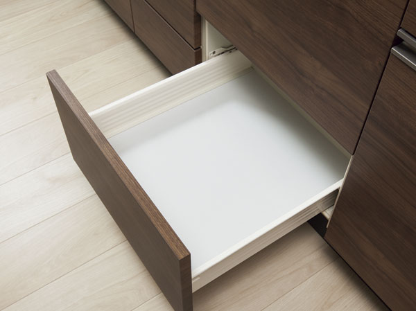 Kitchen.  [Drawer in the enamel bottom plate] Enamel finish bottom plate of the drawer with excellent cleaning properties. By the magnet tool, It can be stored in accordance with the cookware.