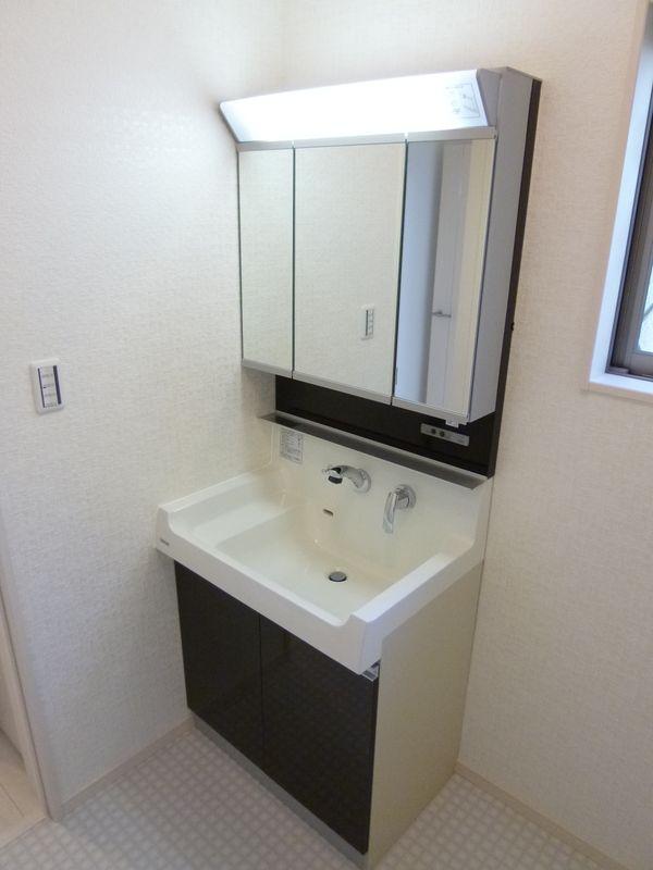 Wash basin, toilet. Wash basin with shampoo for the shower