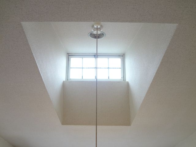 Other room space. With a small small window. It is fashionable