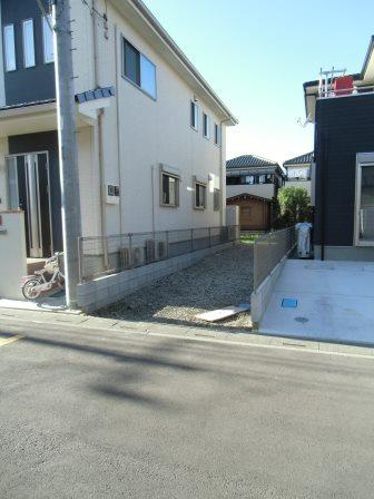 Local photos, including front road. Facing the 6m road frontage 3m. 