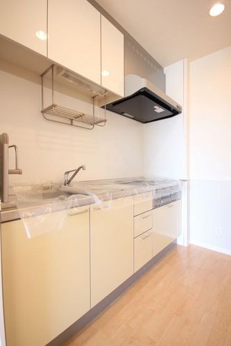 Kitchen. 3 is the neck of the system Kitchen. Storage is abundant there is also hanging cupboard.