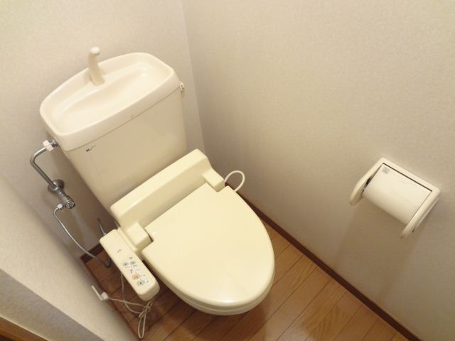 Toilet. Washlet is with