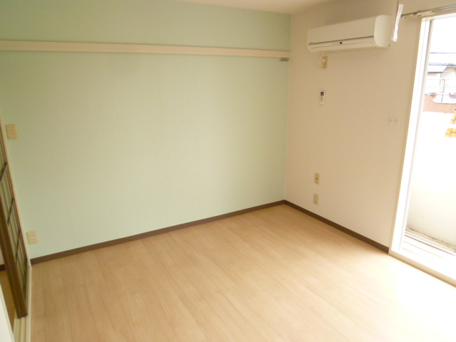 Living and room. The room is now bright with light color accents Cross