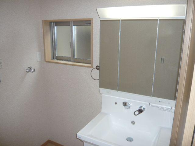 Wash basin, toilet. Vanity unit