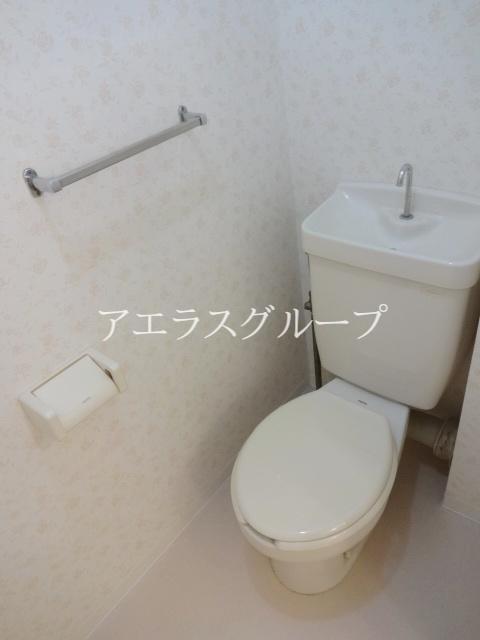 Toilet. There is housed in the upper part