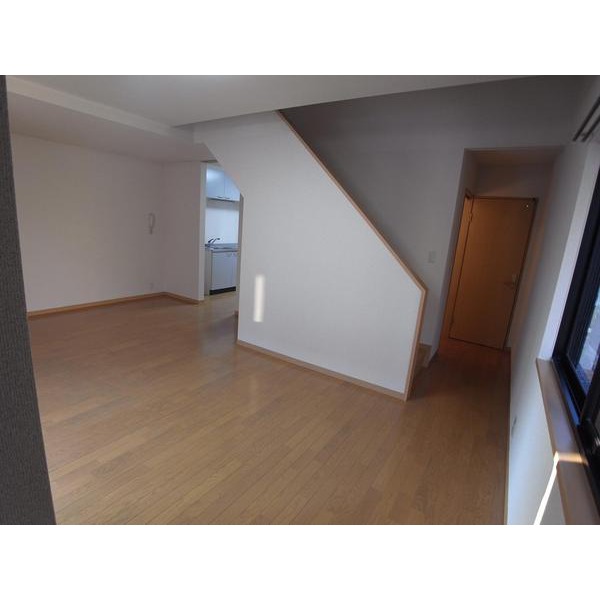 Living and room. Living is an in-stairs