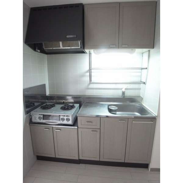 Kitchen. Stove is left behind