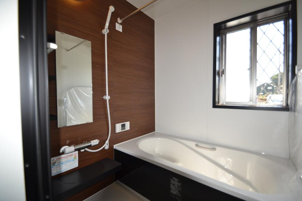 Bathroom. ~ Bathroom of muted colors, Ventilation is also refreshing with a small window ~