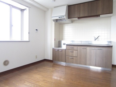 Kitchen. There is a window, Bright and airy kitchen