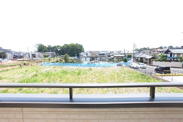 Local appearance photo. Is the view from the second floor balcony. It spreads quiet streets.
