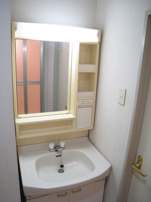 Washroom. Washstand storage rack is useful