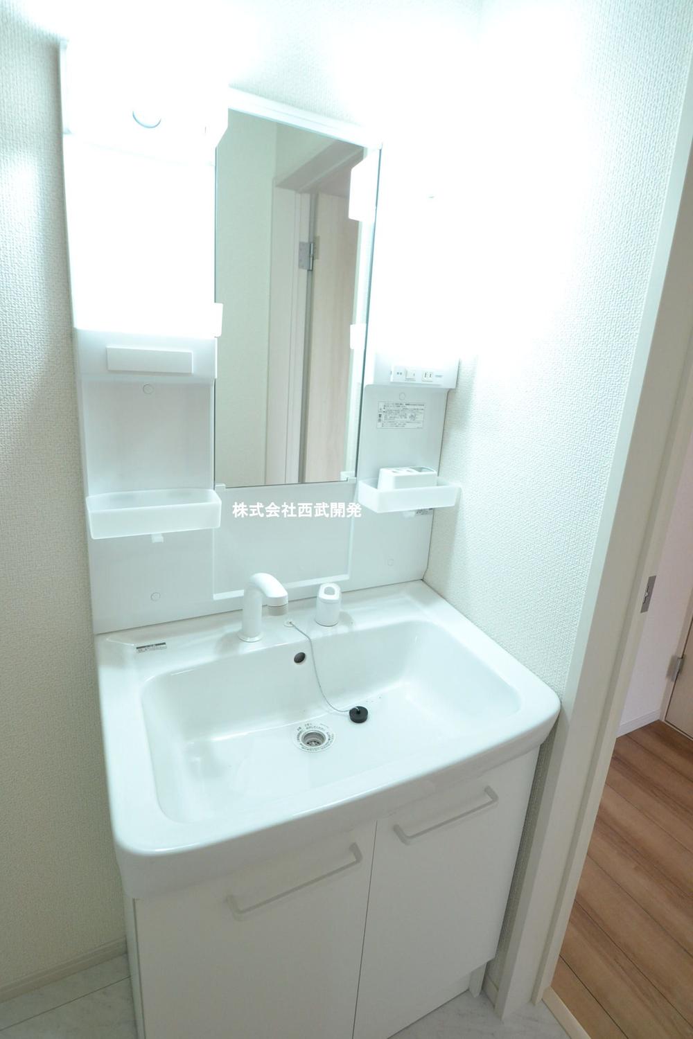 Wash basin, toilet. Bathroom vanity