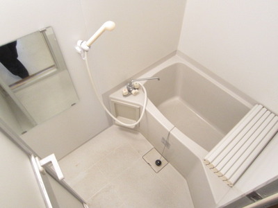 Bath. Bathroom with a large mirror