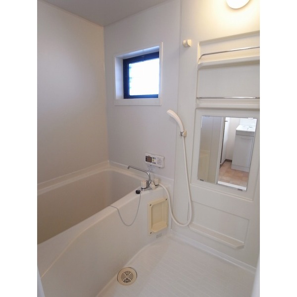 Bath. Bright bathroom with a window