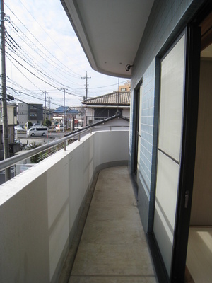 Balcony. Southwestward, L-shaped balcony