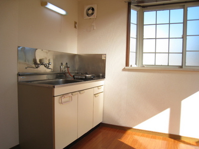 Kitchen. There is a window, Bright kitchen