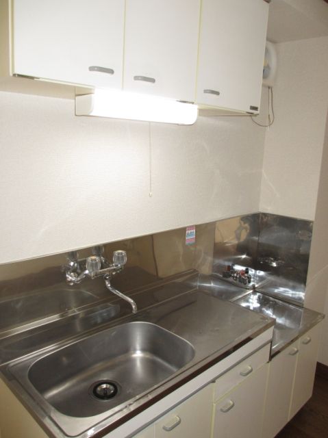 Kitchen. Also easy two-burner gas stove corresponding cuisine
