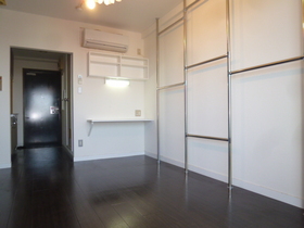 Living and room. Of the room is with a pipe hanger.
