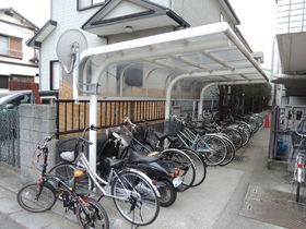 Building appearance. It is a roof with bicycle parking.