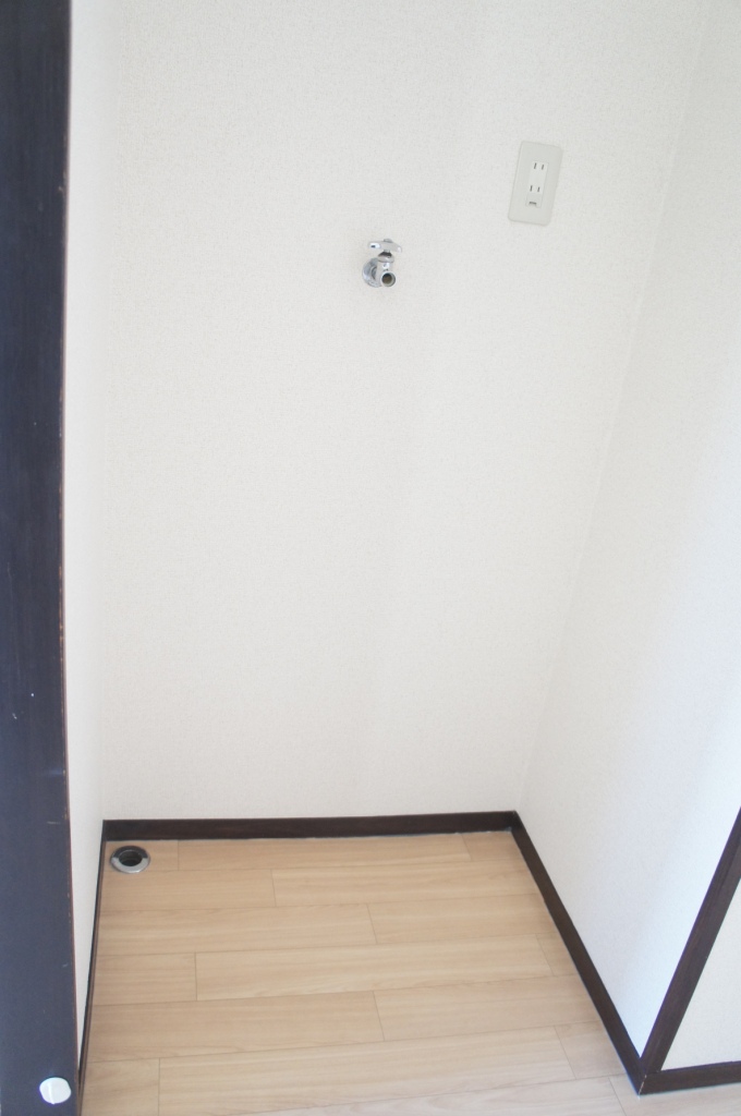 Other Equipment. Washing machine in the room