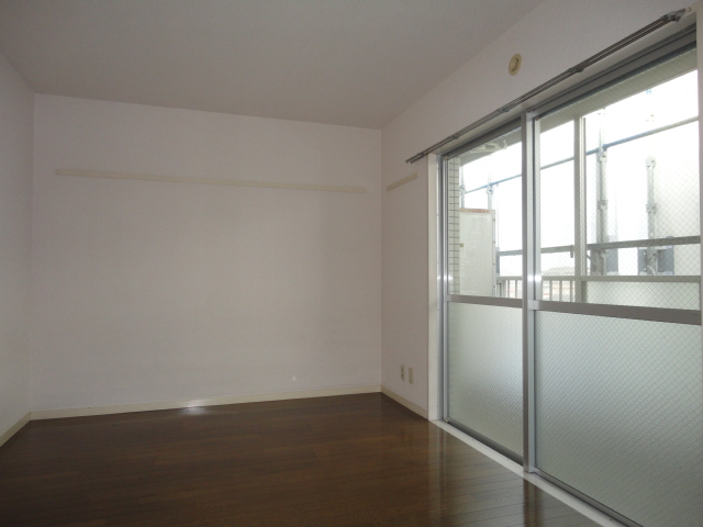 Living and room. (It is a photograph of another room)