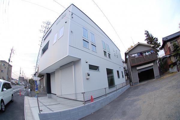 Local appearance photo. Front road with a sidewalk