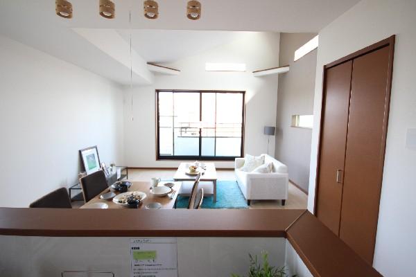 Living. Detached interior introspection Pictures - family smiling in the living room over the counter