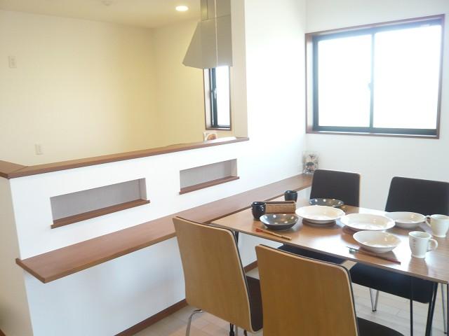 Living. Dining part of the A Building. Ease's right to use even counter were fixtures in the kitchen.