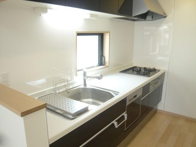 Kitchen. B Building, Dishwasher with counter kitchen.