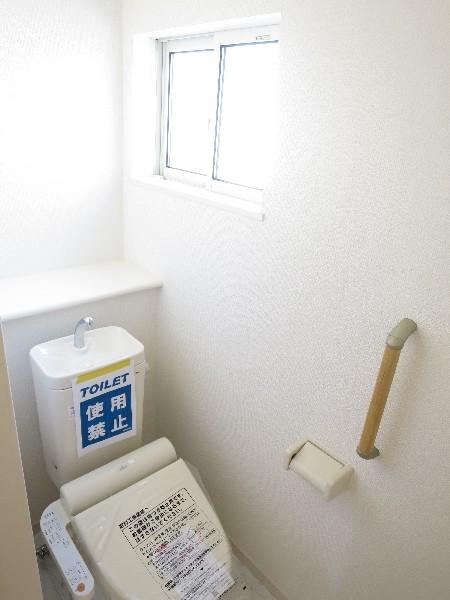 Toilet. Bright toilet with a window. 