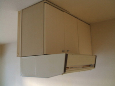 Kitchen. Cupboard at the top of the kitchen